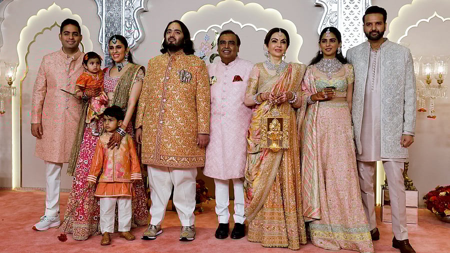 <div class="paragraphs"><p>Ambanis pose for a family picture on their arrival.</p></div>